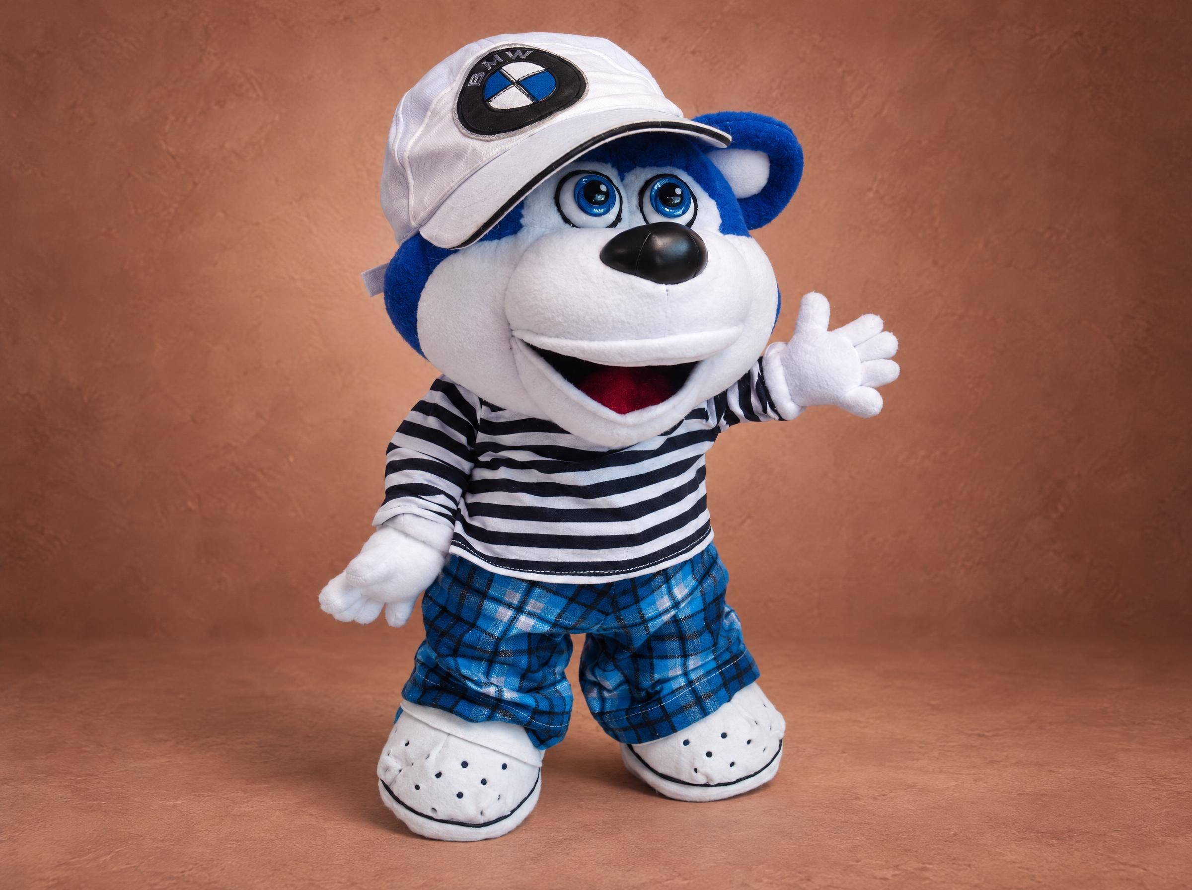 Blue bear plush sewn from a drawing, waving in a striped top, plaid pants and felt clogs, handmade to order