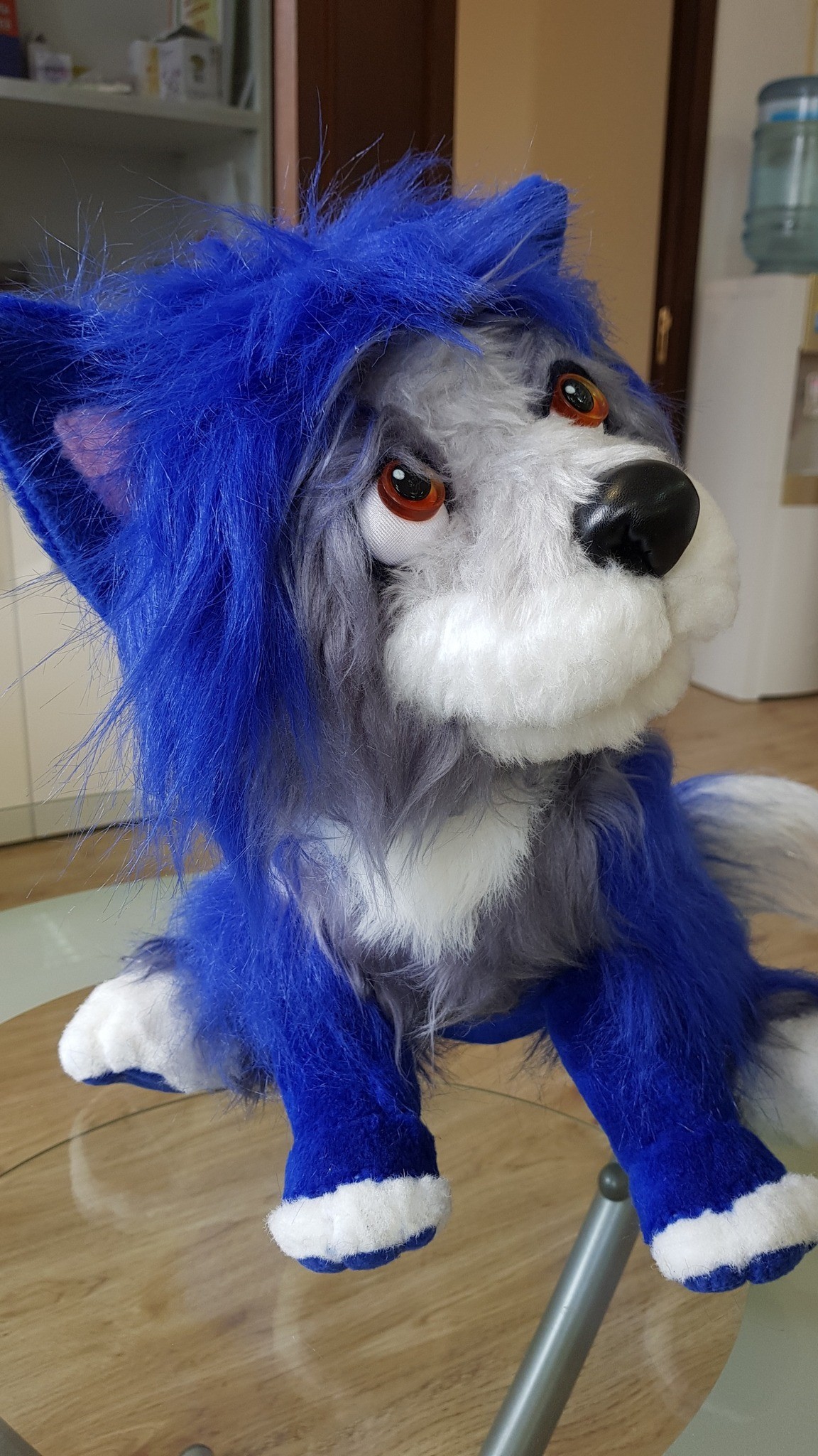 Blue dog plush with big amber eyes, a black nose and a grey-white muzzle, sewn to order in long faux fur