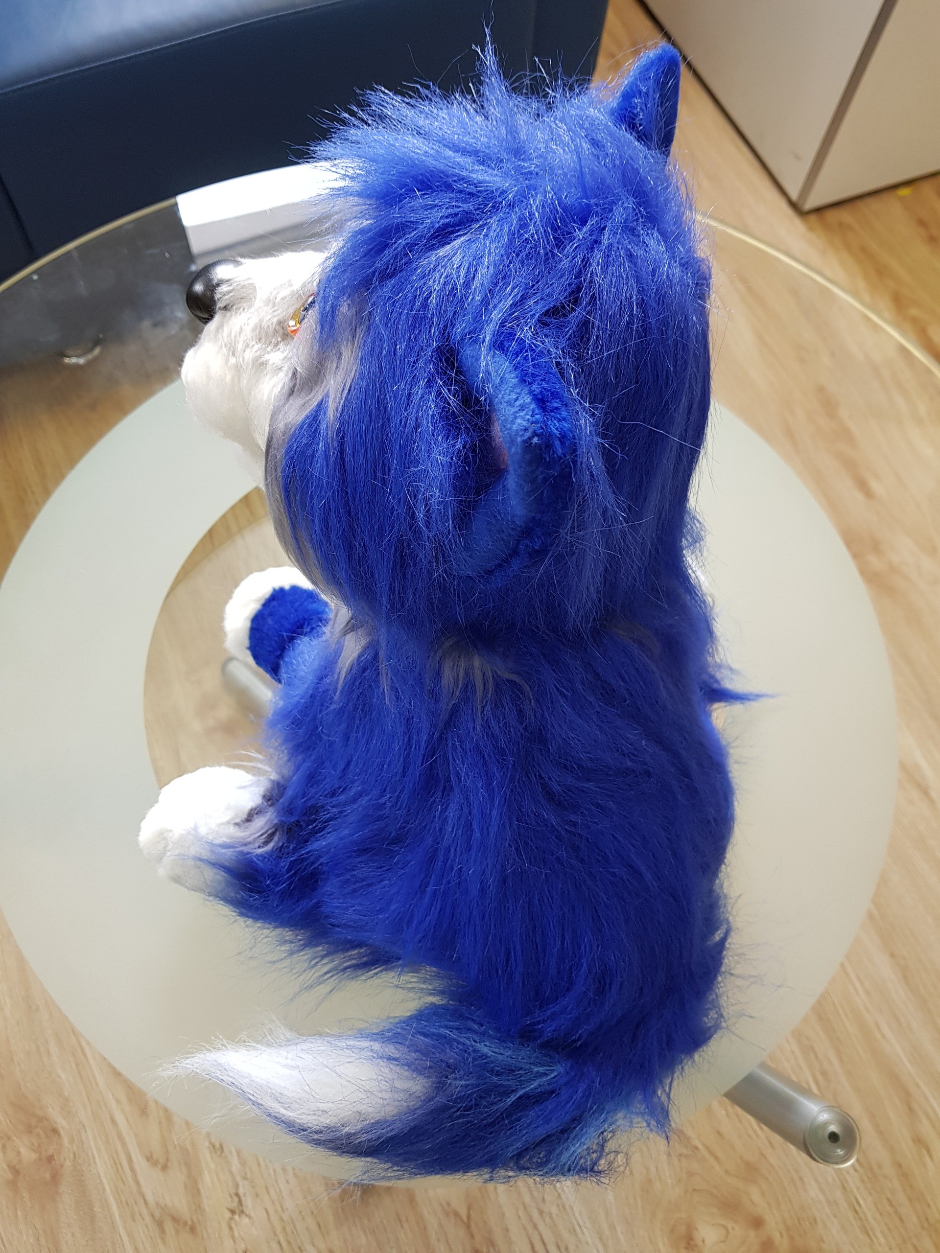 Blue dog plush with a white tail tip Blue dog plush with long shaggy faux fur on the back and a white-tipped tail, made to order