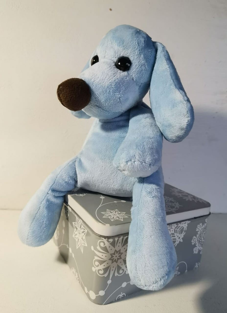 Blue dog plush with long legs Light blue dog plush with long loose legs dangling over a tin box, sewn by hand to order