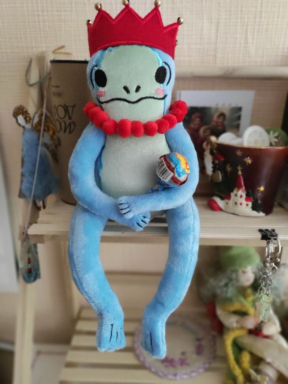 Blue frog plush holding a small toy Blue frog plush in a crown holding a small toy in her long hand, sticker plush handmade to order