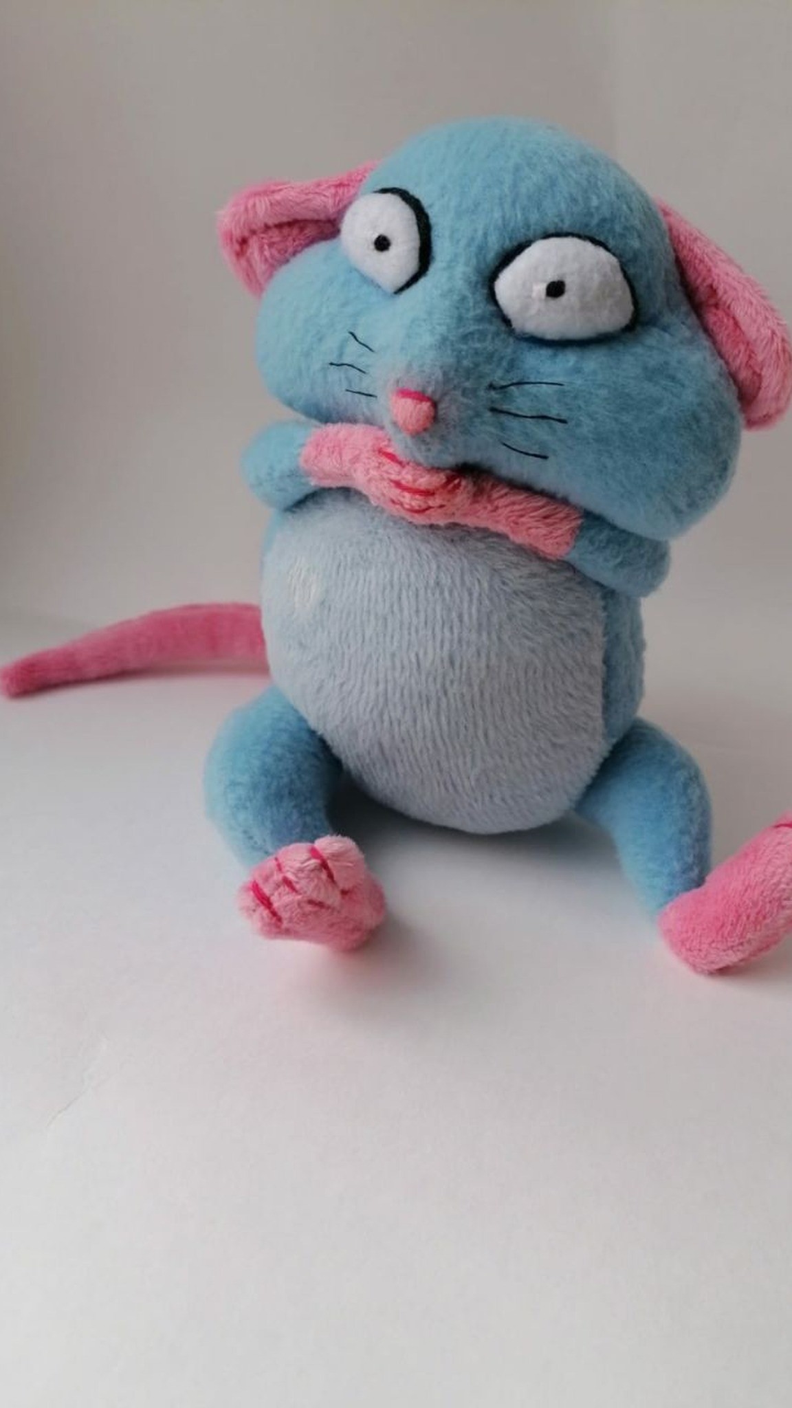 Blue rat plush sitting with a pale blue belly, pink feet with red toe lines and a long tail, handmade to order