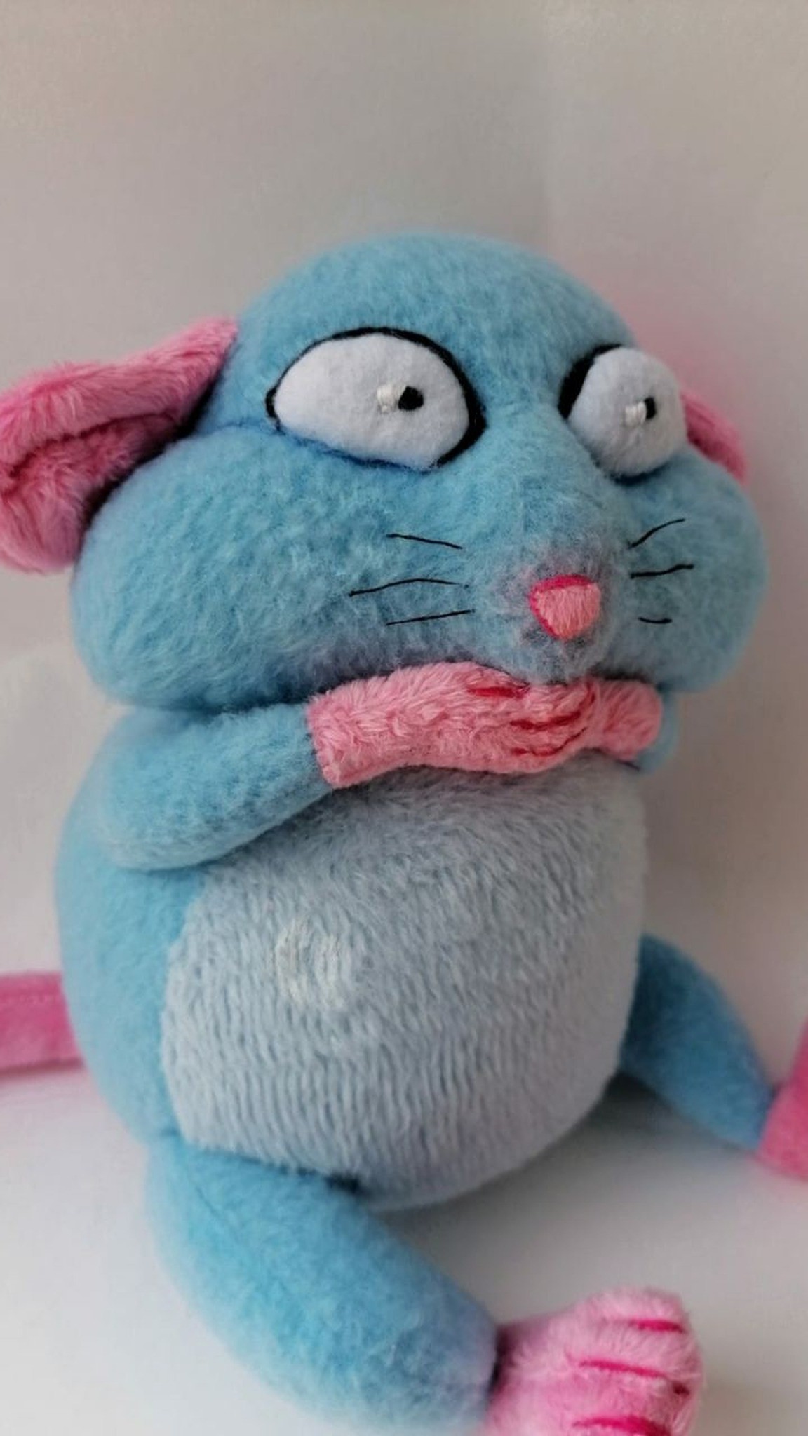 Startled face of a blue rat sticker plush: black-outlined eyes, stitched whiskers, pink nose, made to order
