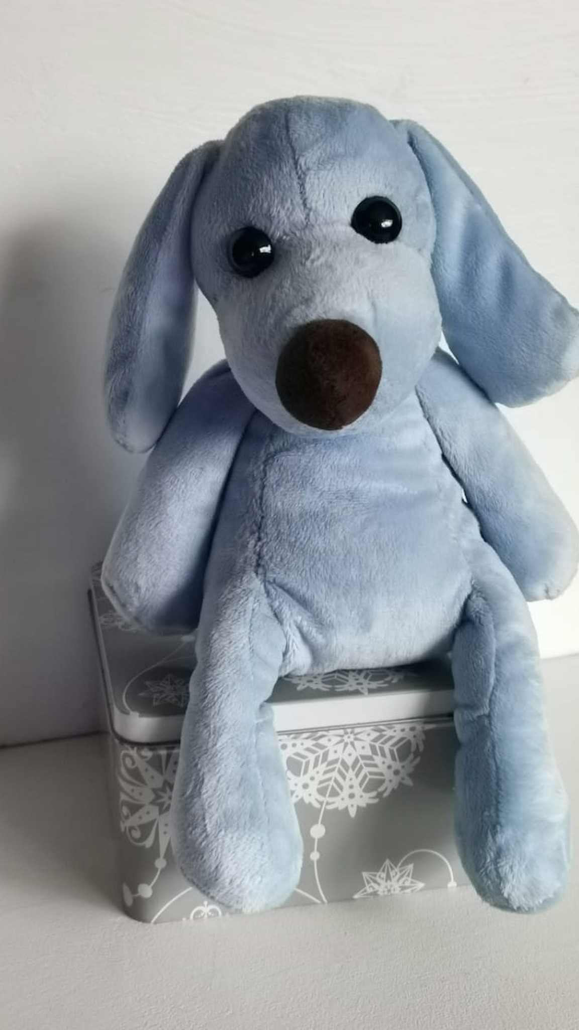 Blue stuffed dog with long floppy ears, black bead eyes and a round brown nose, made to order