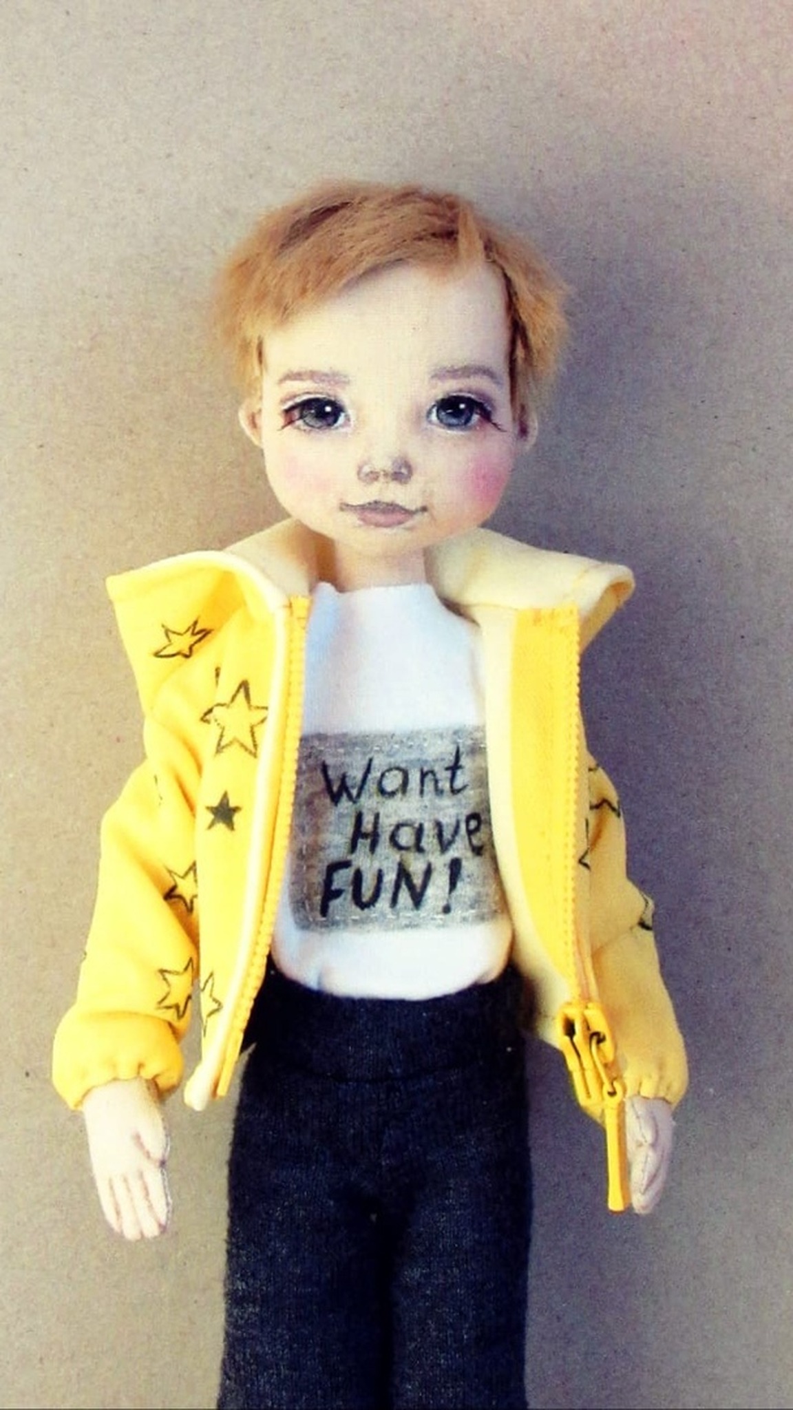 Boy portrait doll in a yellow star hoodie and a "Want Have FUN!" T-shirt, custom textile doll made to order