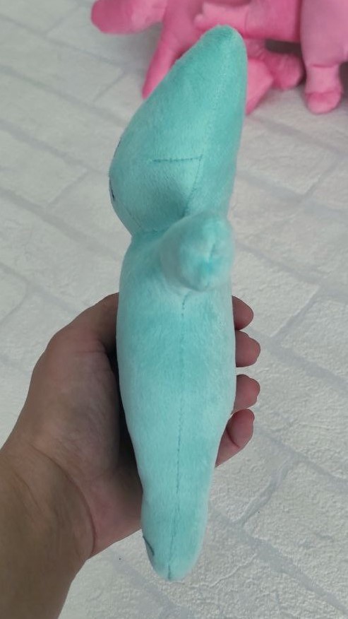 Branded teddy bear in mint plush Branded teddy bear in soft mint plush, slim profile and stitched seams, a custom company gift made to order