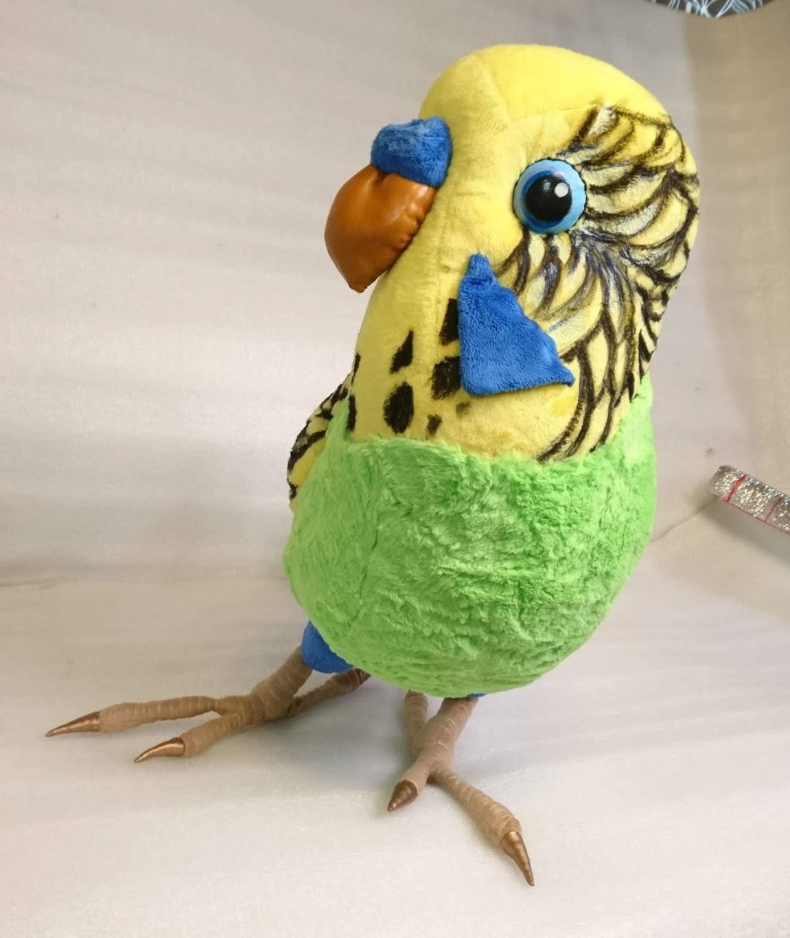 Budgie plush with an orange beak Budgie plush with an orange sculpted beak, blue cere and hand-drawn head stripes, made to order