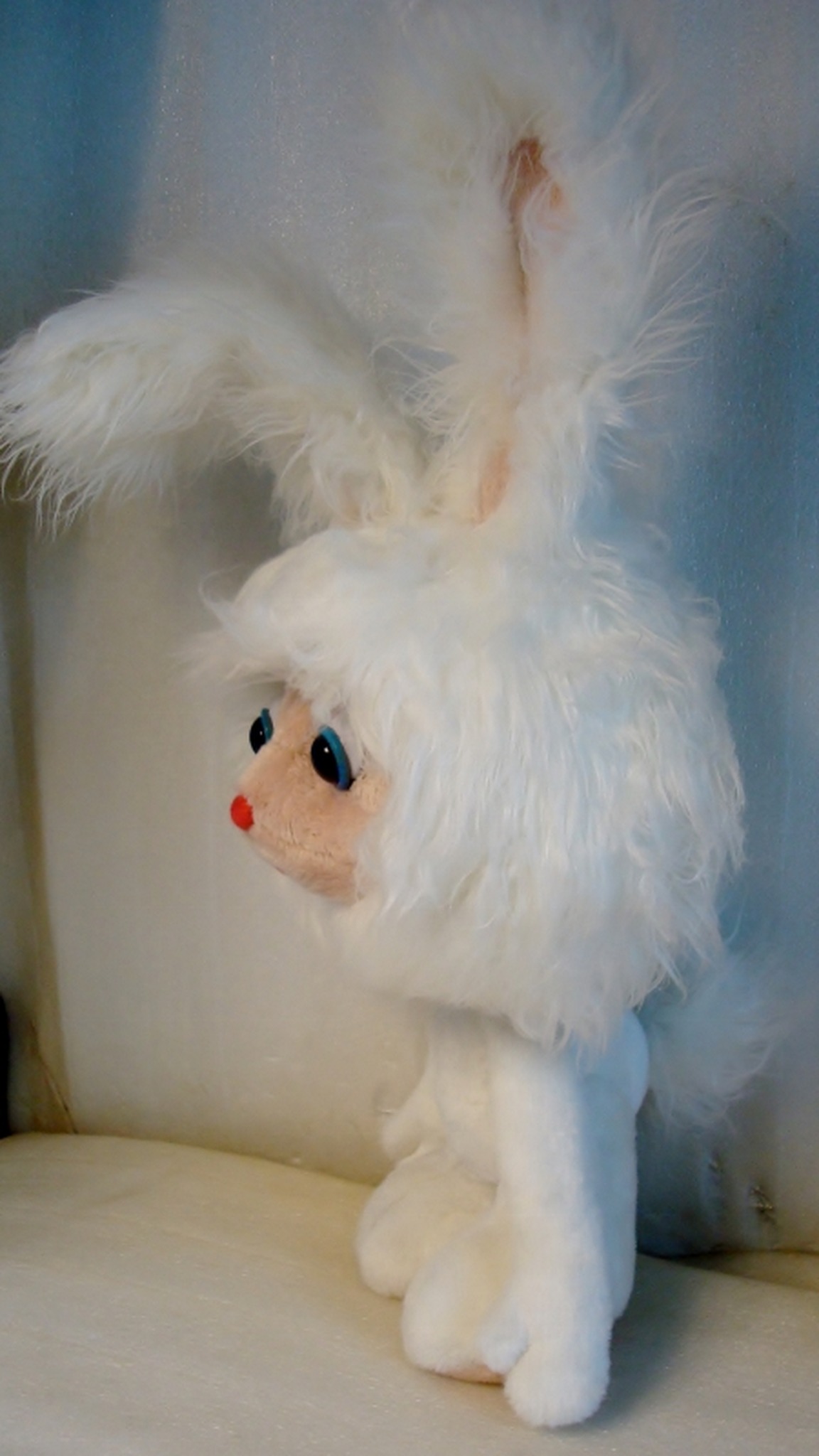 Cartoon bunny plush with a shaggy faux fur head and a fluffy tail, handmade to order