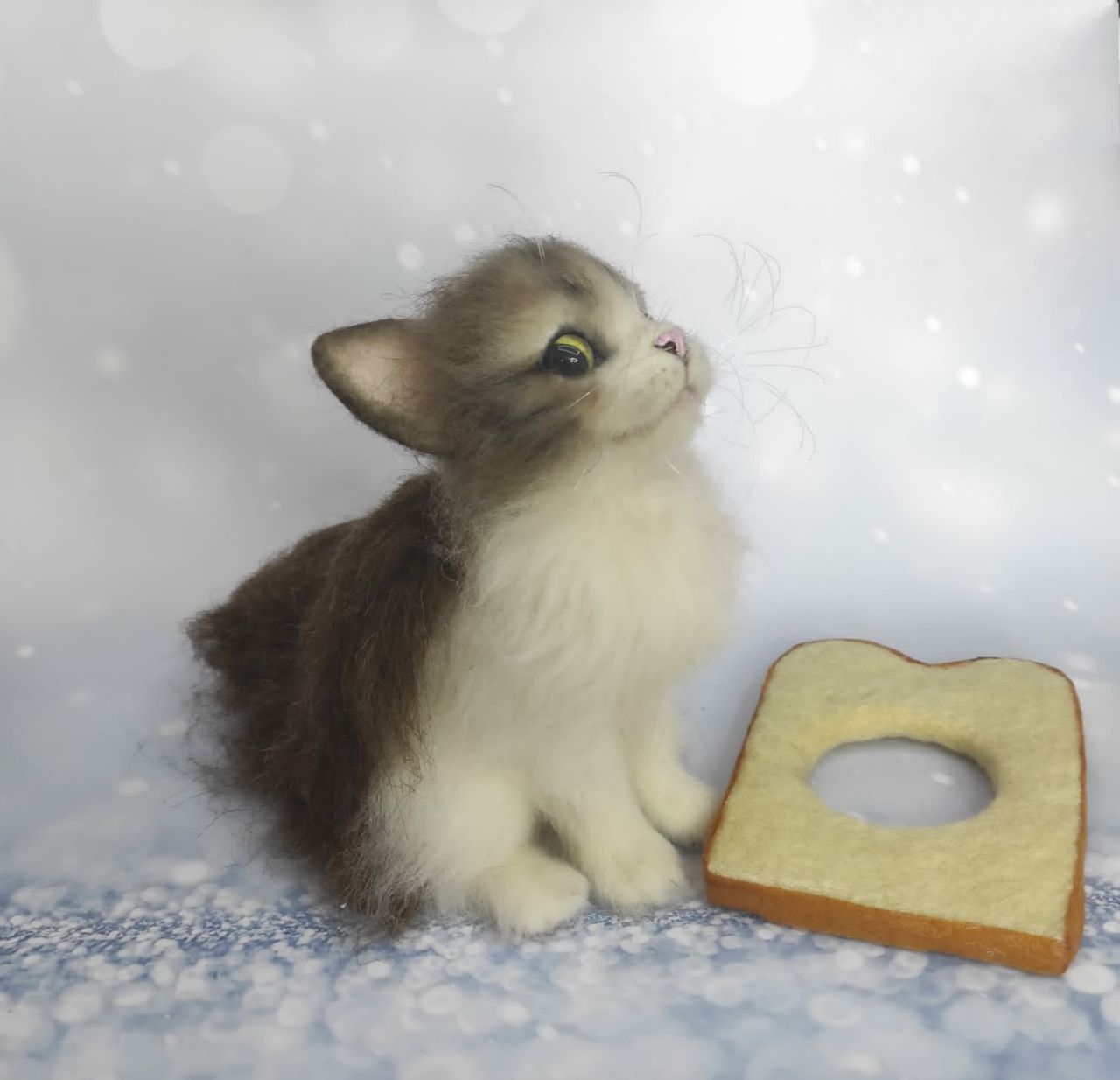 Cat bread plush with the bread slice off Cat bread plush kitten sitting next to its toy bread slice, the slice comes off, realistic meme cat to order
