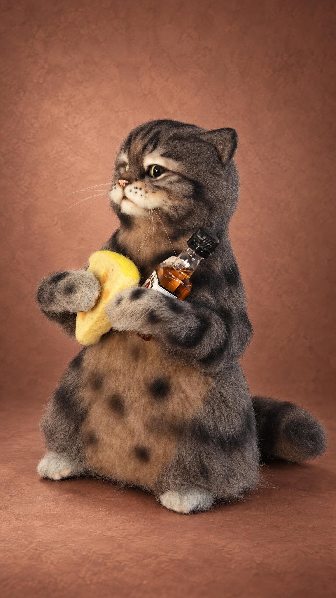 Handmade cat meme plush sewn to order: sulky tabby sitting up with a cheese wedge and whisky bottle in paws