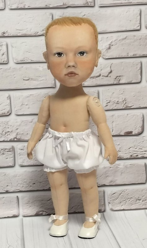 Cloth body of a custom baby doll Cloth body of a custom baby doll in white bloomers and ribbon shoes, painted face, sewn to order from a photo