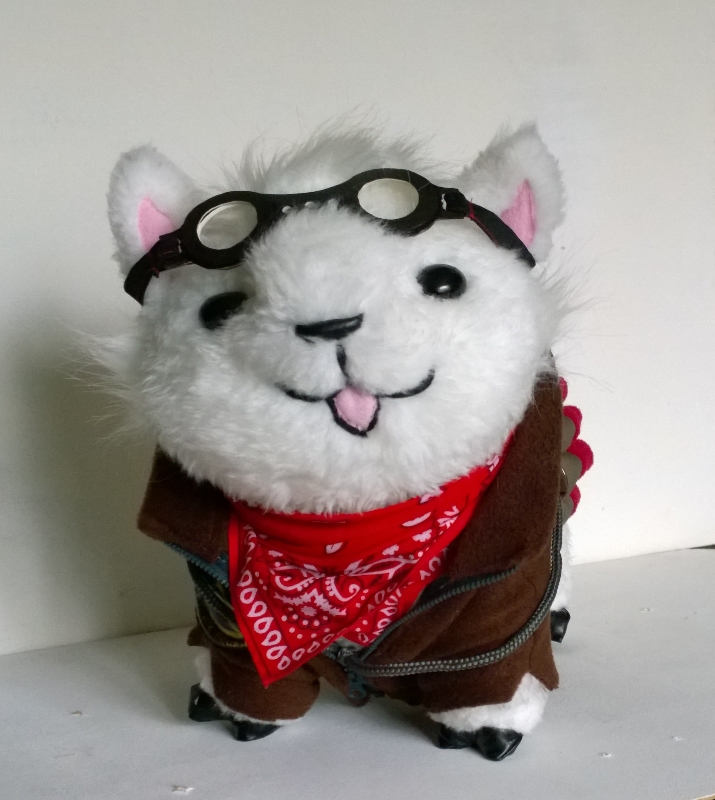 Custom alpaca plush with a winking face Custom alpaca plush with a winking face and pink tongue, goggles and a red bandana, handmade to order