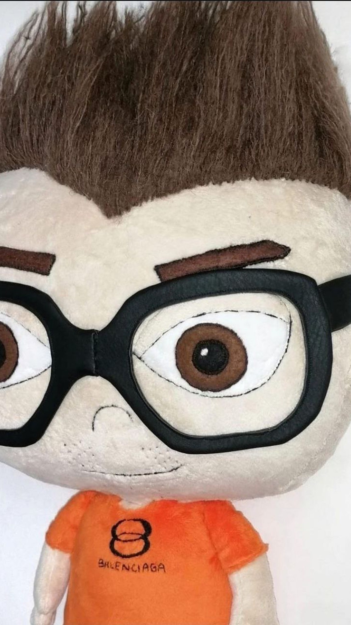 Custom anime doll with big felt eyes, black glasses and embroidered stubble, made by hand to order