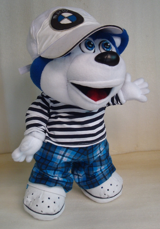 Custom bear plush waving Custom bear plush from a drawing waving a white five-finger hand, wearing a white cap and plaid pants, handmade
