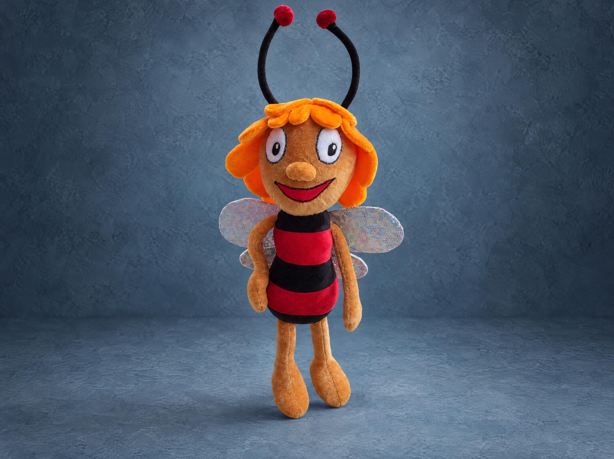 Custom bee plush with orange petal hair, red and black stripes and silver wings, handmade to order