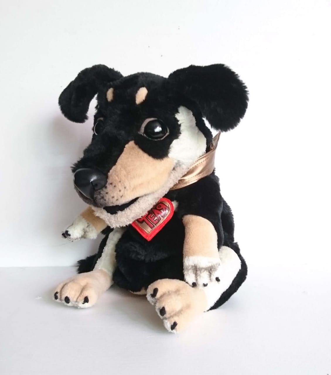 Custom dachshund puppet for lessons Custom dachshund puppet for a teacher, sewn to order: tan muzzle, black nose, bronze collar and heart tag