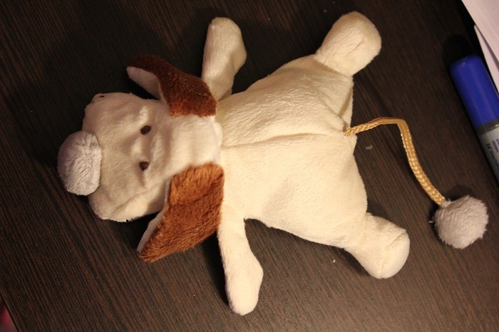 Custom dog plush copy with a braided tail Custom dog plush copy with a braided cord tail and grey pompom, a smaller twin of a favourite toy, made to order