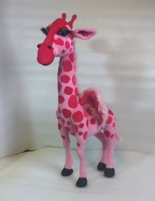 Custom giraffe plush from a drawing Custom giraffe plush sewn from a drawing, pink with a raspberry head, long black lashes and a smiling muzzle