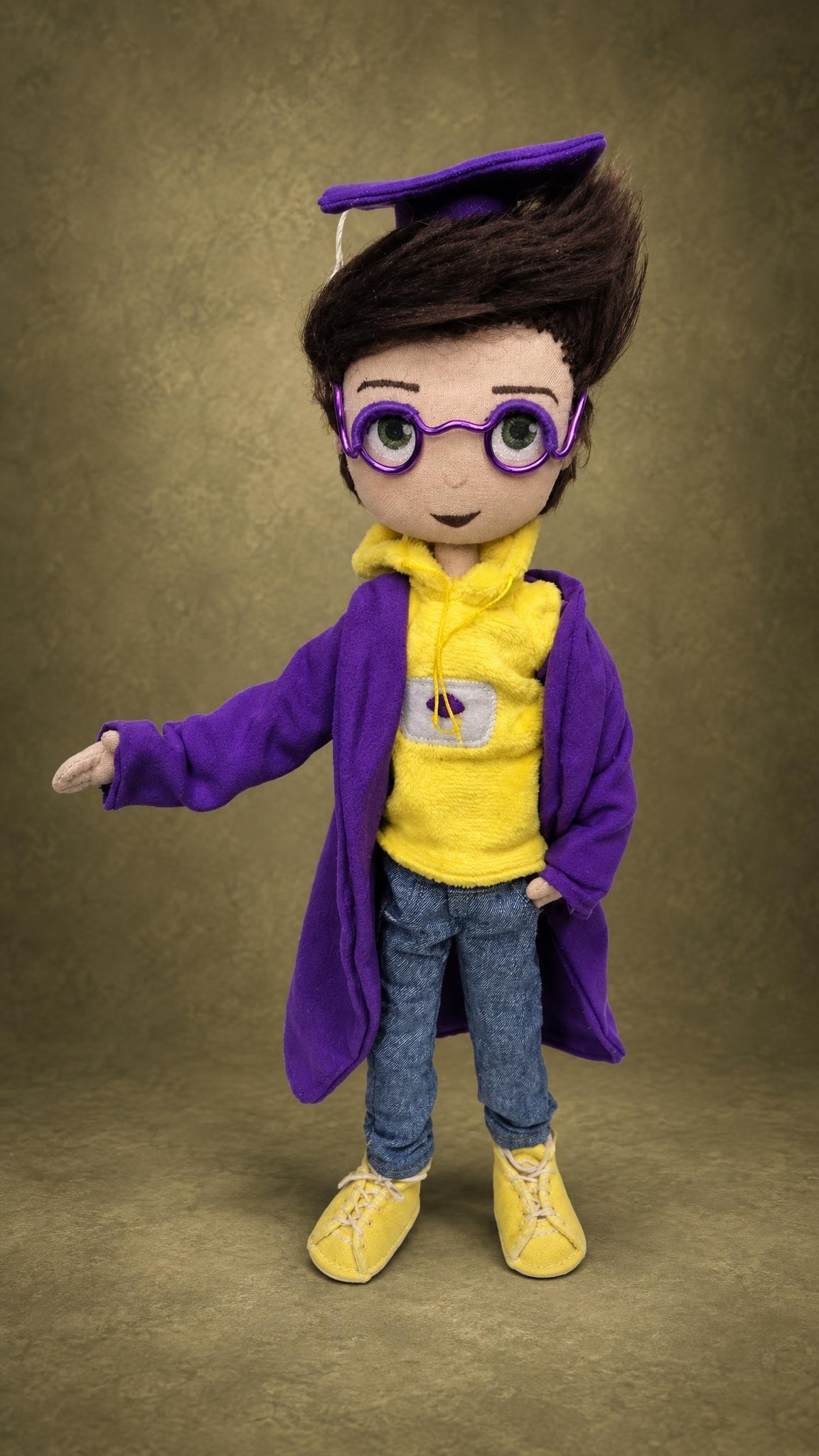 Graduate mascot doll with round violet wire glasses and a tasseled cap, sewn by hand to order for a company