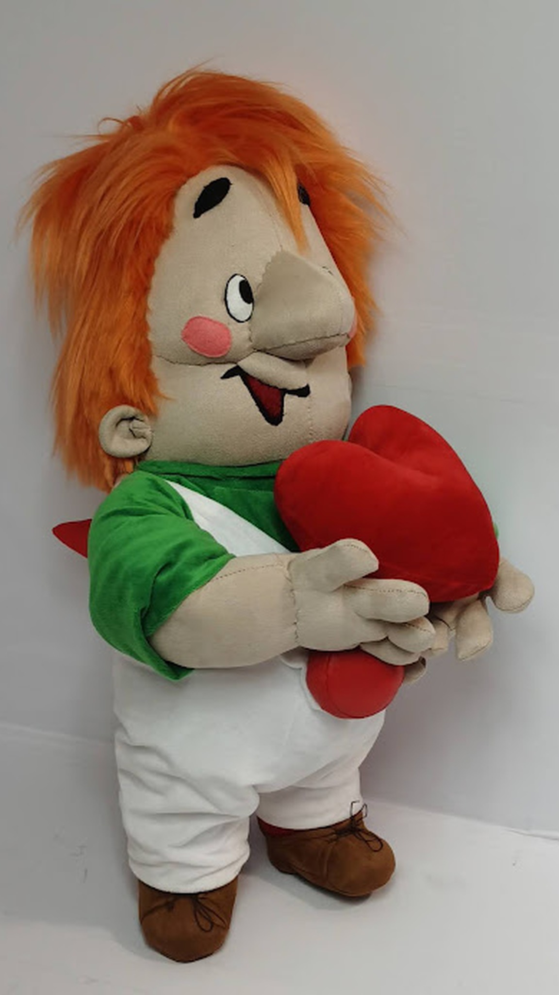 Custom Karlsson plush with a red plush heart, sewn by hand to order: long nose, big grin, ginger hair
