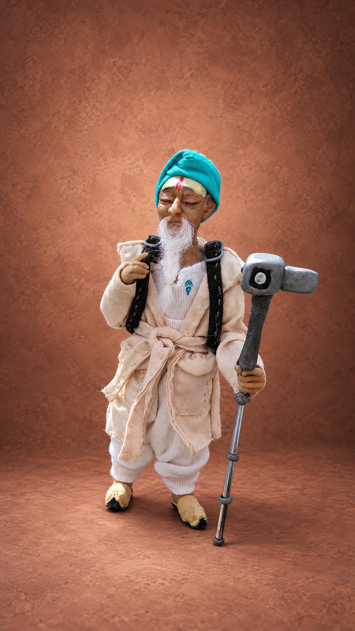Polymer clay mascot doll: a bearded wanderer with a backpack and camera pole, handmade to order for a brand