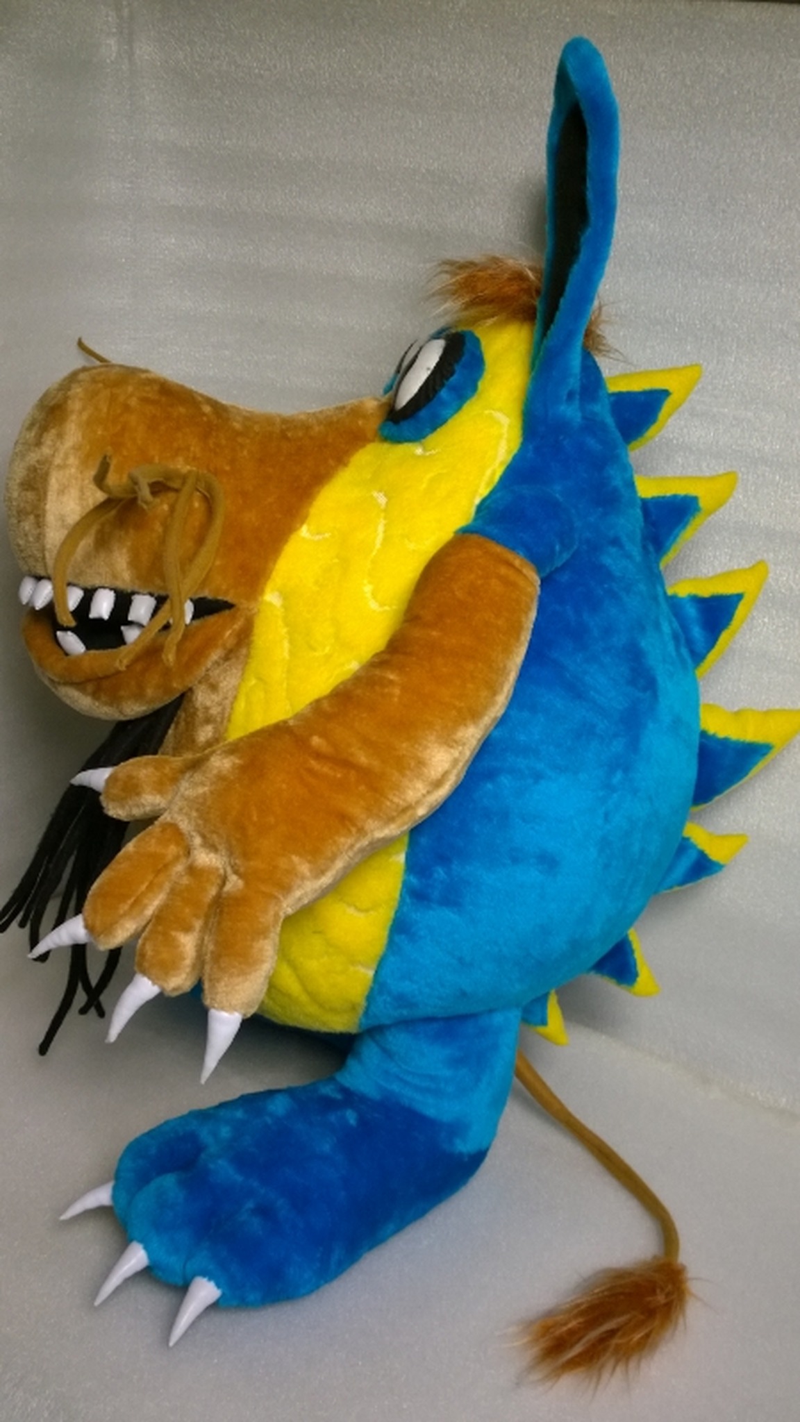 Custom monster plush of Shtusha-Kutusha, handmade: blue back with a yellow crest and a tan tufted tail
