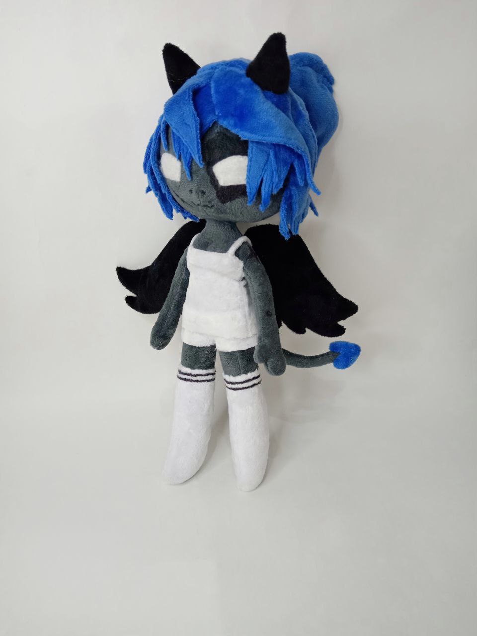 Custom OC plush doll with black wings Custom OC plush doll of a demon girl, handmade to order: black feathered wings, blue hair, striped socks