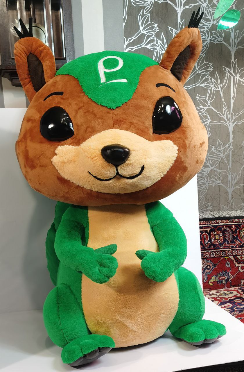 Custom squirrel mascot with logo Custom squirrel mascot plush with the company logo on its forehead, green paws and cream belly, made to order