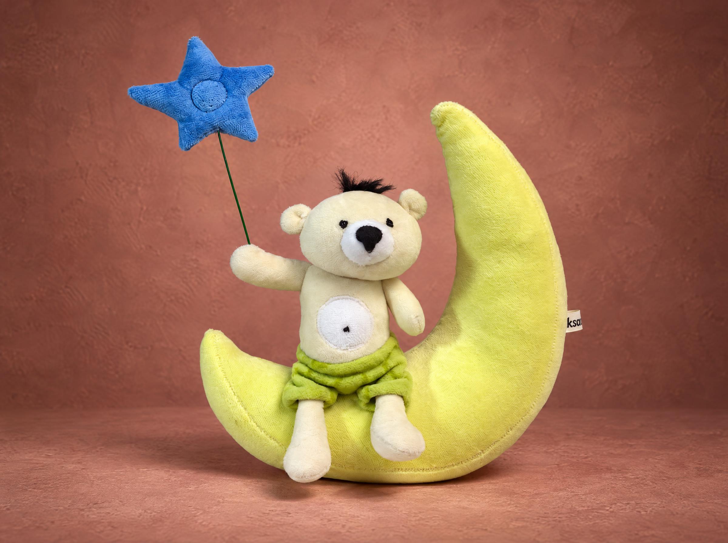 Custom teddy bear from a drawing, sewn to order: cream bear in green shorts on a yellow plush moon, blue star