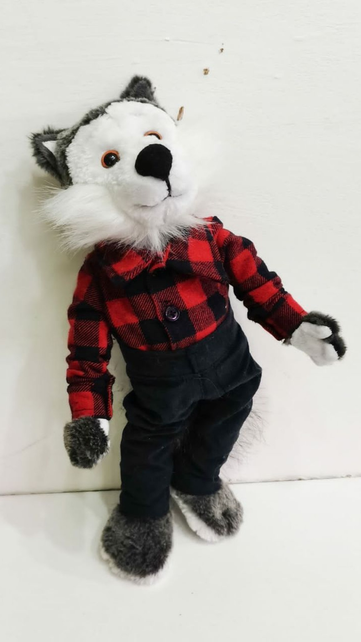Custom wolf stuffed animal with grey ears and a white ruff, recreated to order from a childhood photo