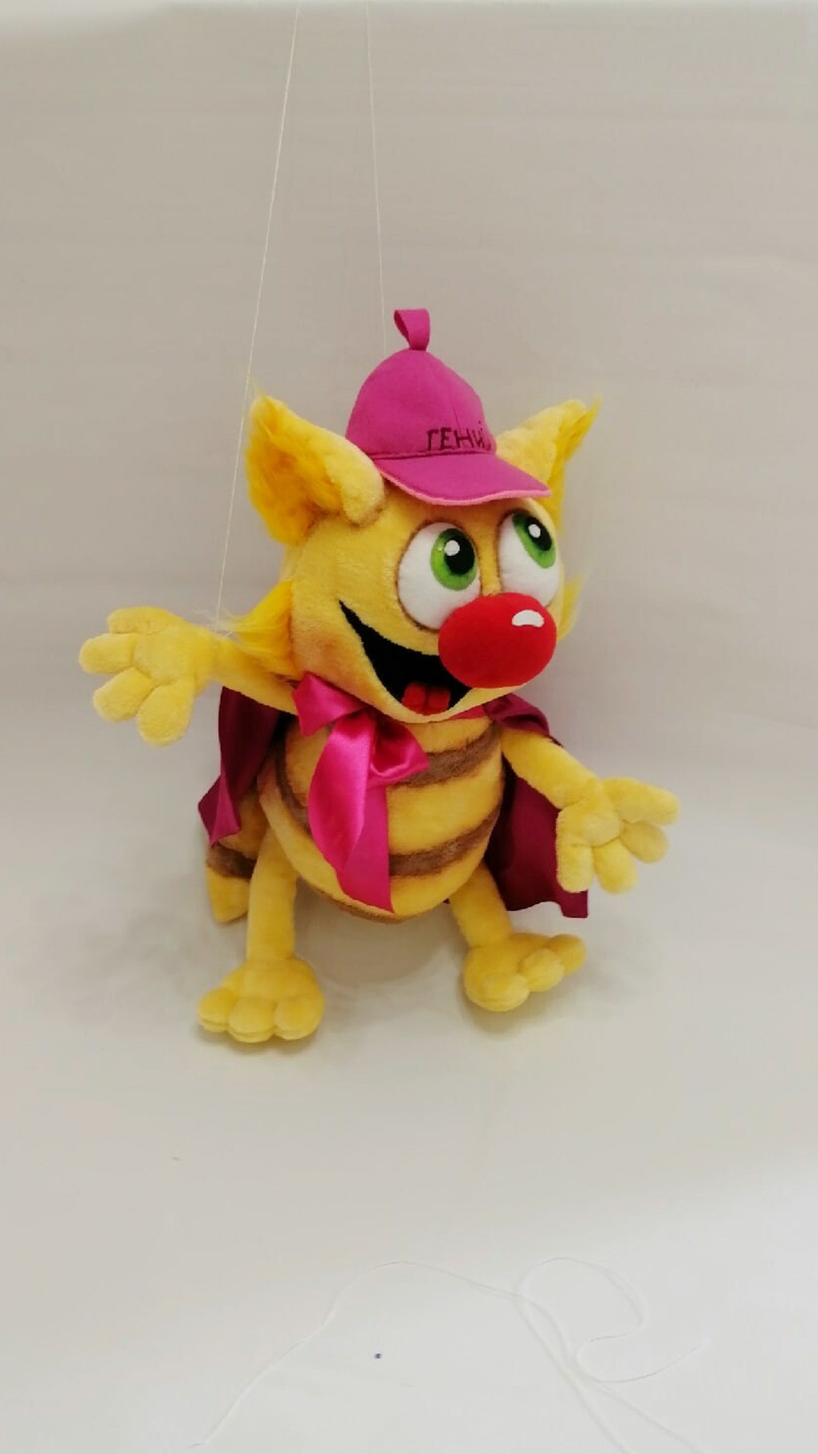 Da Vinci the cat plush with arms spread wide, pink bow and burgundy cape, handmade to order from a book
