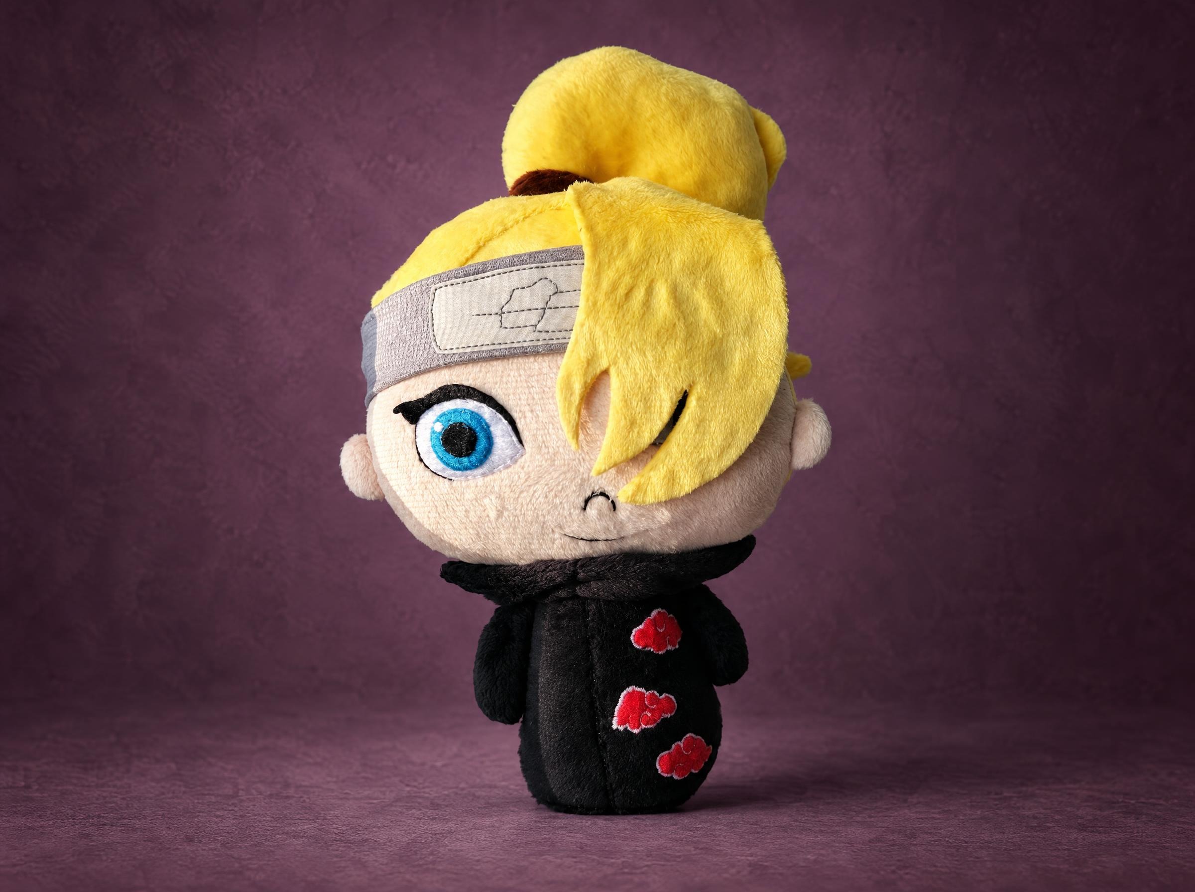 Chibi Deidara plush from Naruto with a blond ponytail, blue eye and Akatsuki cloak with red clouds, made to order