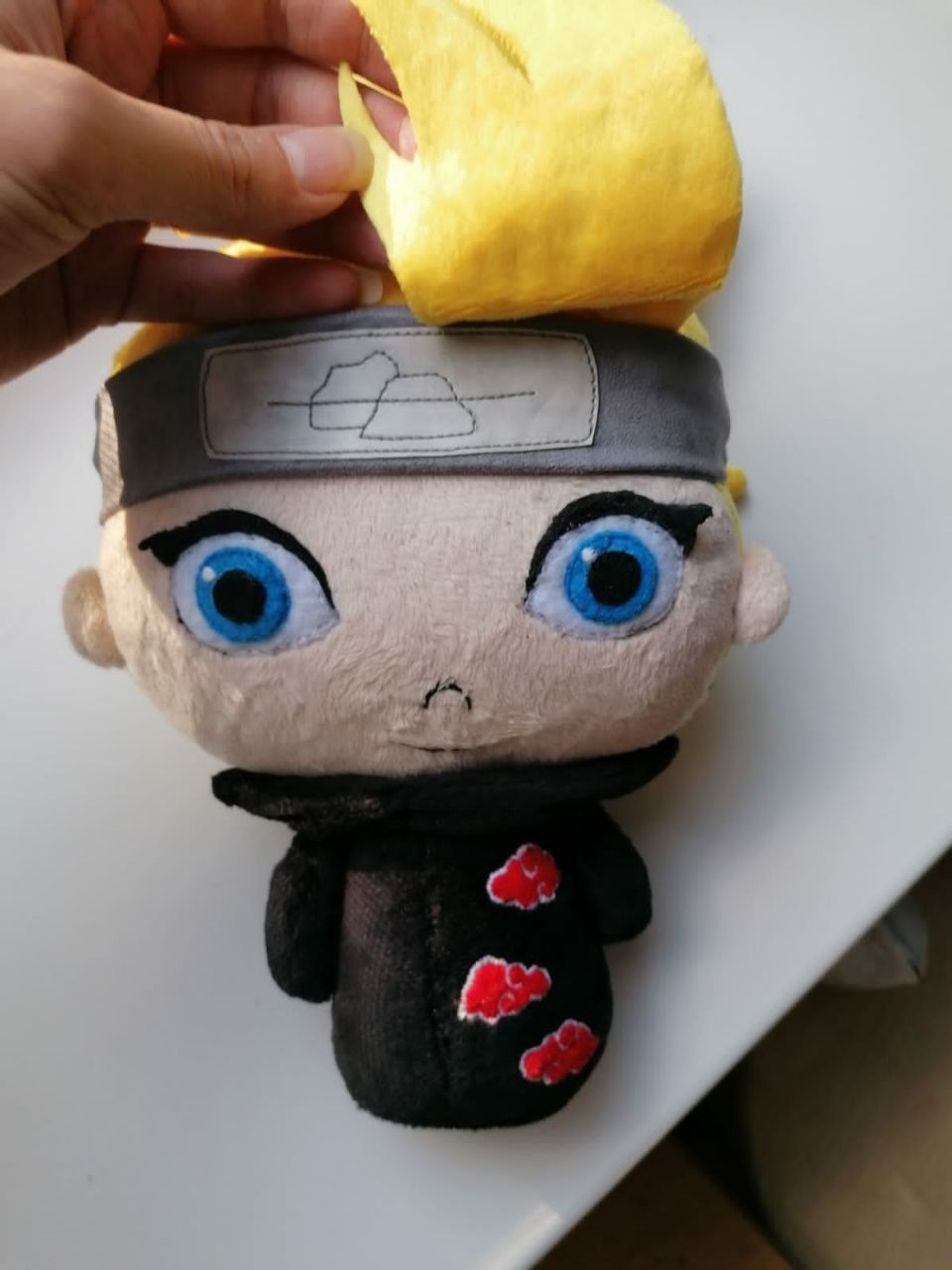 Deidara plush with the bang lifted over his hidden eye Custom Deidara plush with the yellow bang lifted to show his hidden second blue eye, handmade to order