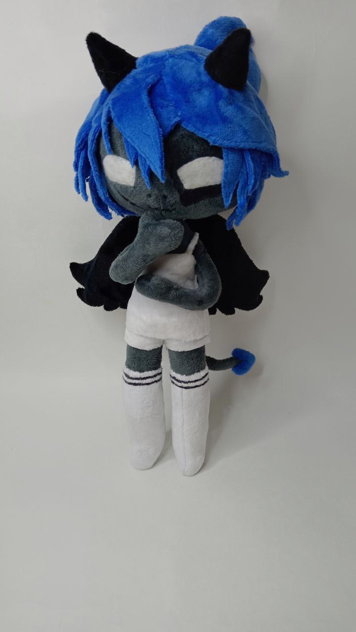 Demon girl OC doll Kayla, made to order from a drawing, hand under her chin, blue hair and freckles