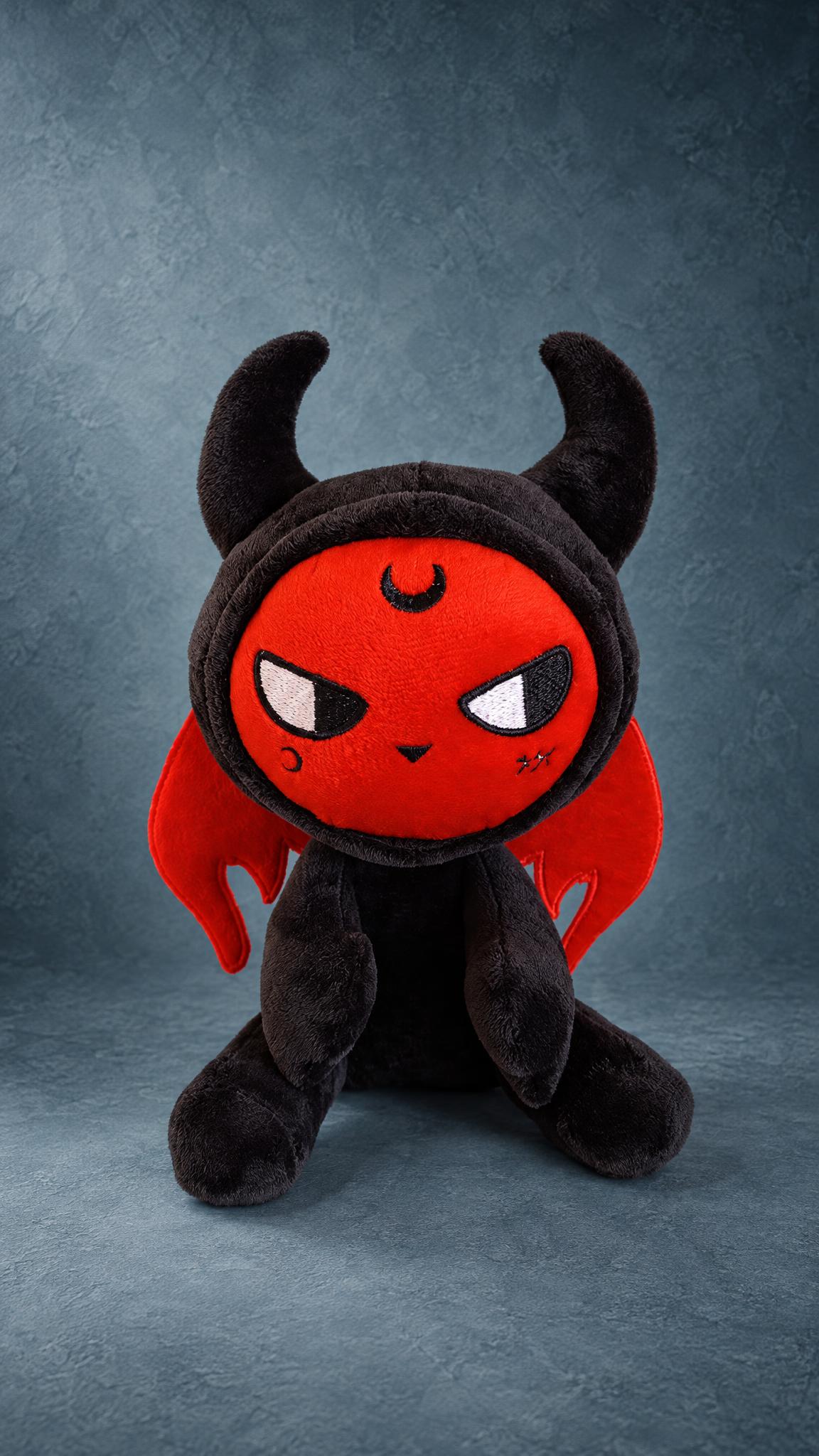 Custom devil plush with embroidered crescent moon and sly eyes, black horned hood, red wings, sewn to order
