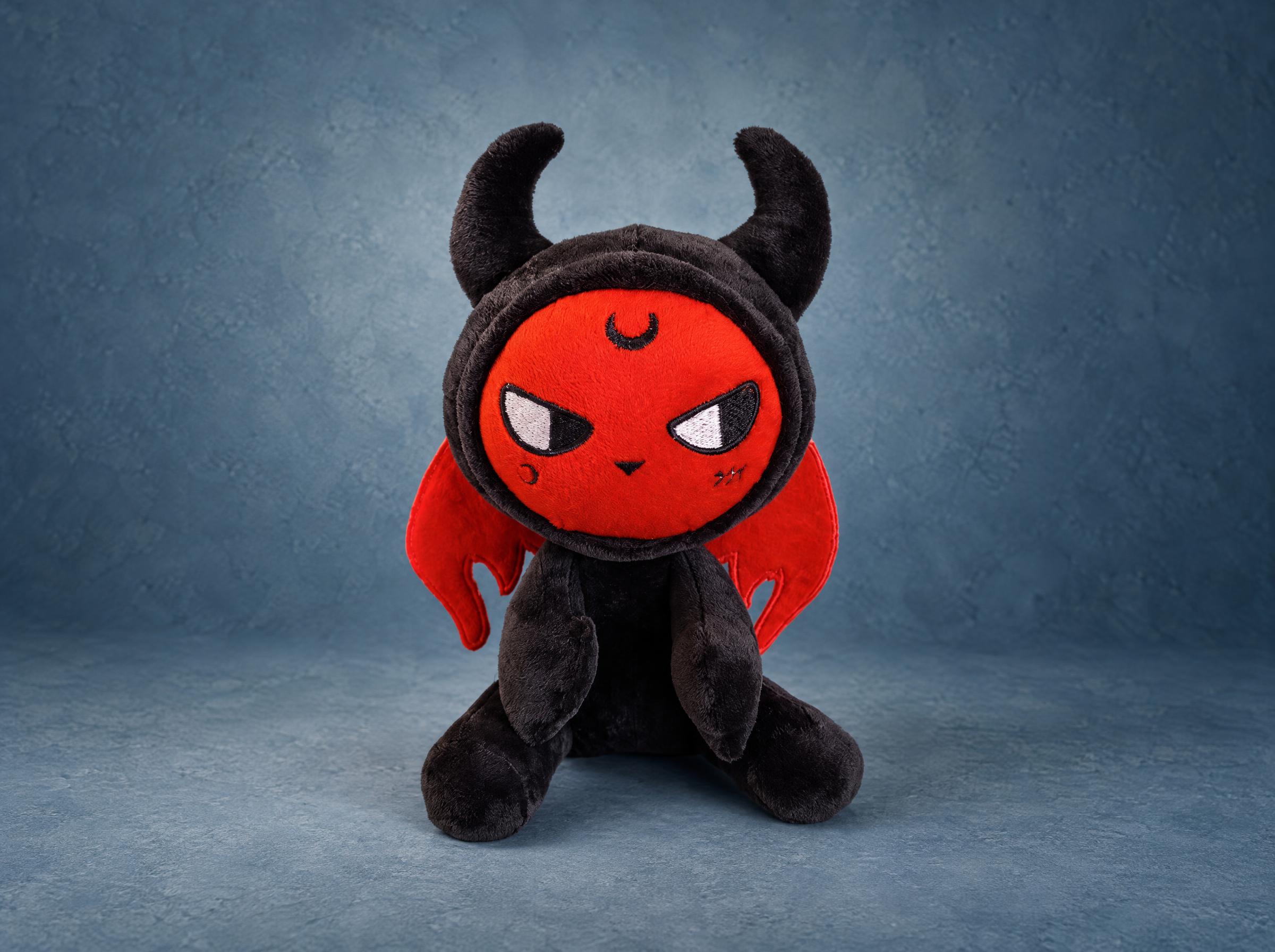 Little devil plush mascot with red face, black horned hood and red wings, custom made to order from a sketch