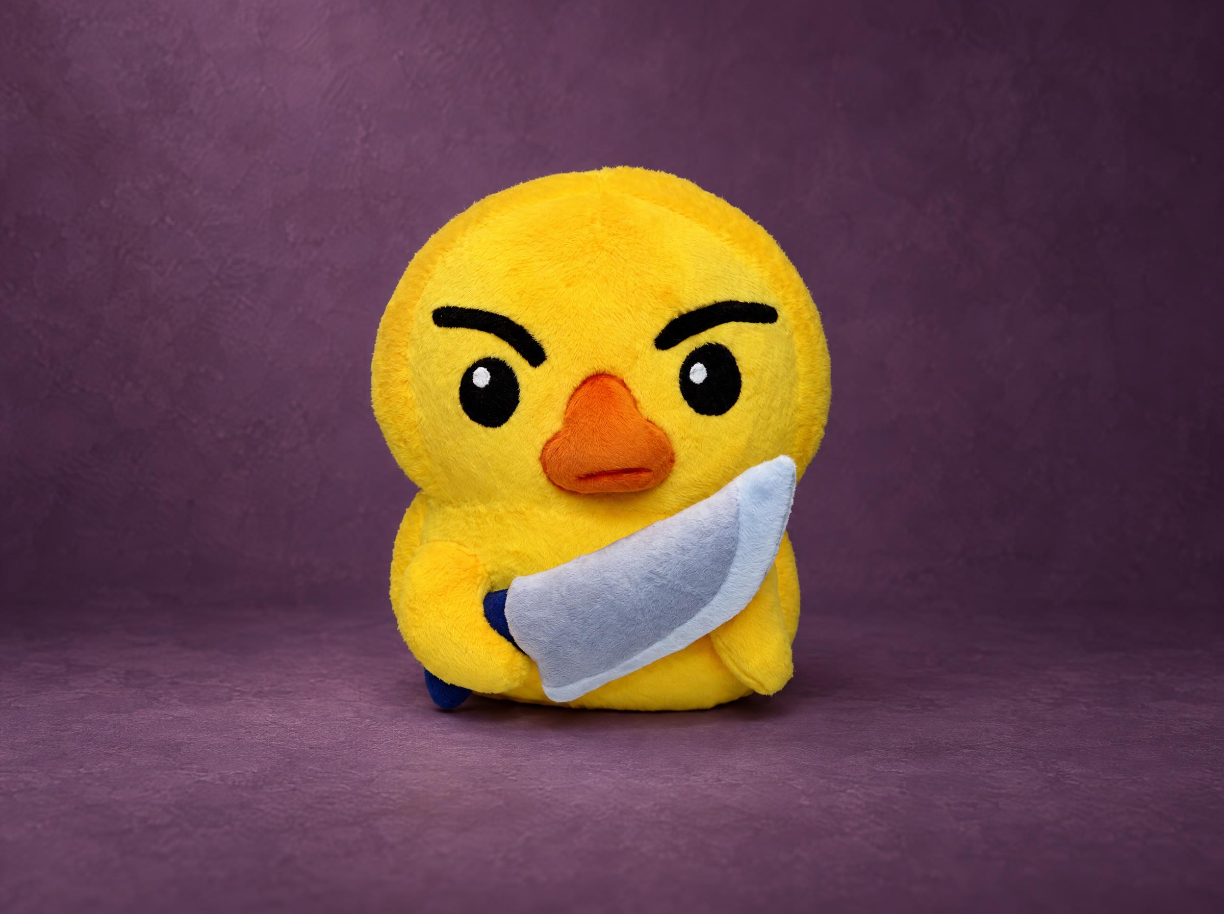 Yellow duck with knife plush with frowning brows and a soft fabric knife, custom made to order from a sticker