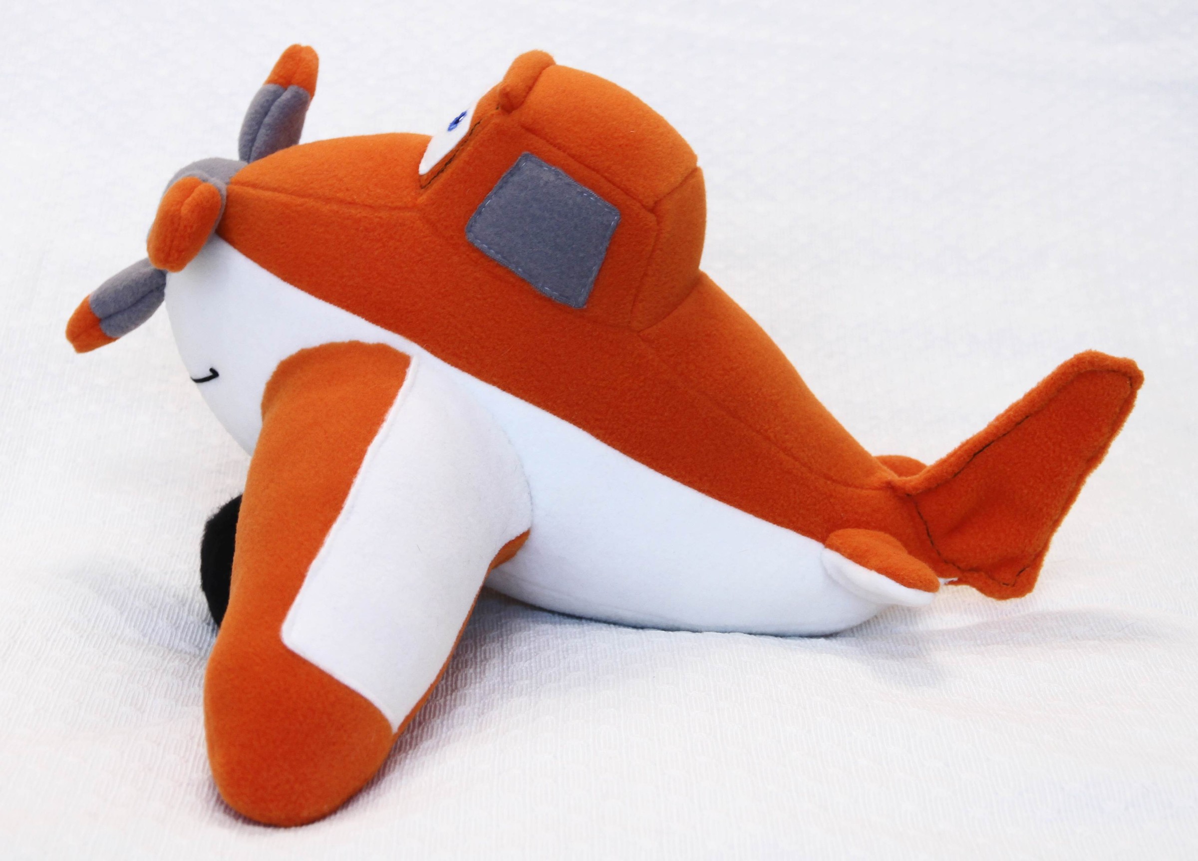 Dusty Crophopper plush wings and cockpit Dusty Crophopper plush with orange wings, white stripes and grey cockpit windows, handmade Planes toy to order