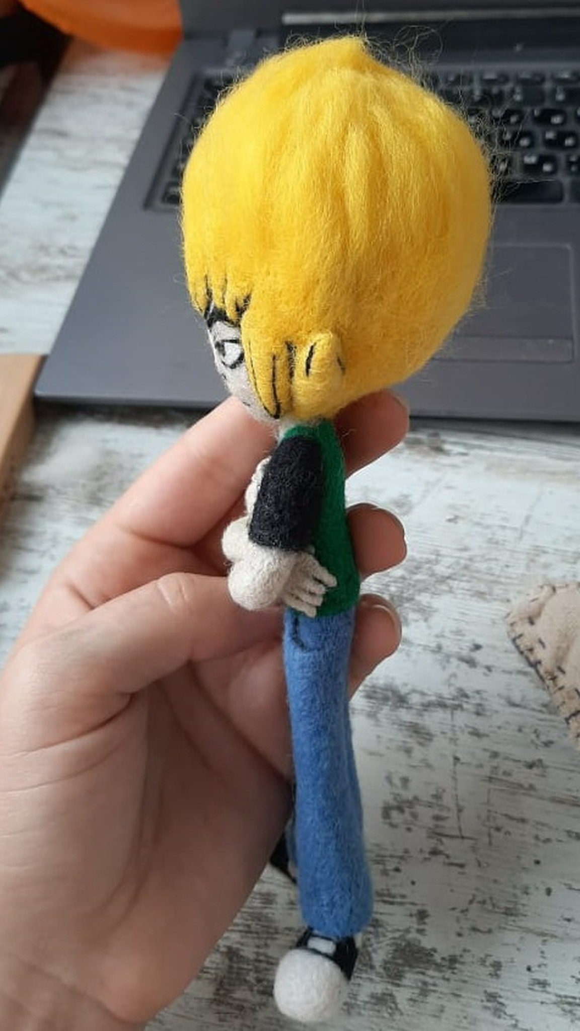 Felted anime doll with a big crown of lemon-yellow wool hair and slim blue felt legs, made to order
