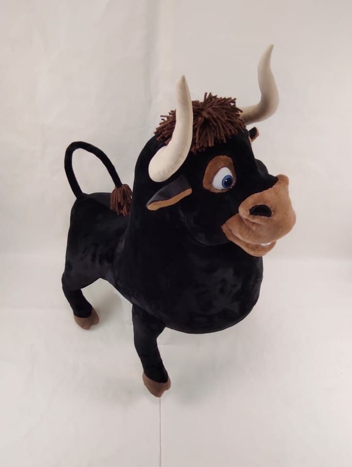 Ferdinand the Bull plush with curled tail Ferdinand the Bull plush with a curled tail and yarn tassel, tan muzzle and blue eyes, custom made to order
