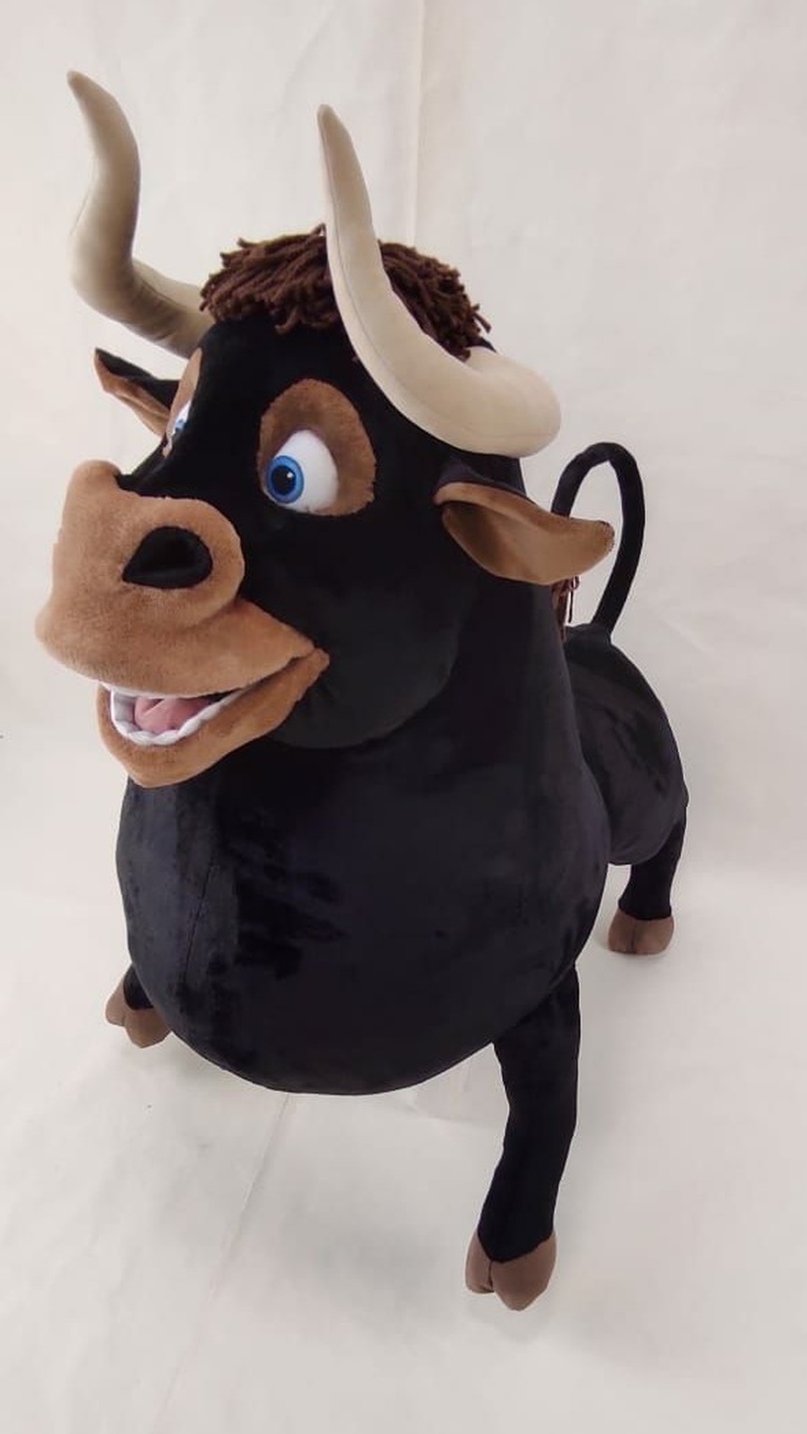 Giant Ferdinand plush with a wide smile and blue eyes, the Blue Sky film bull handmade to order