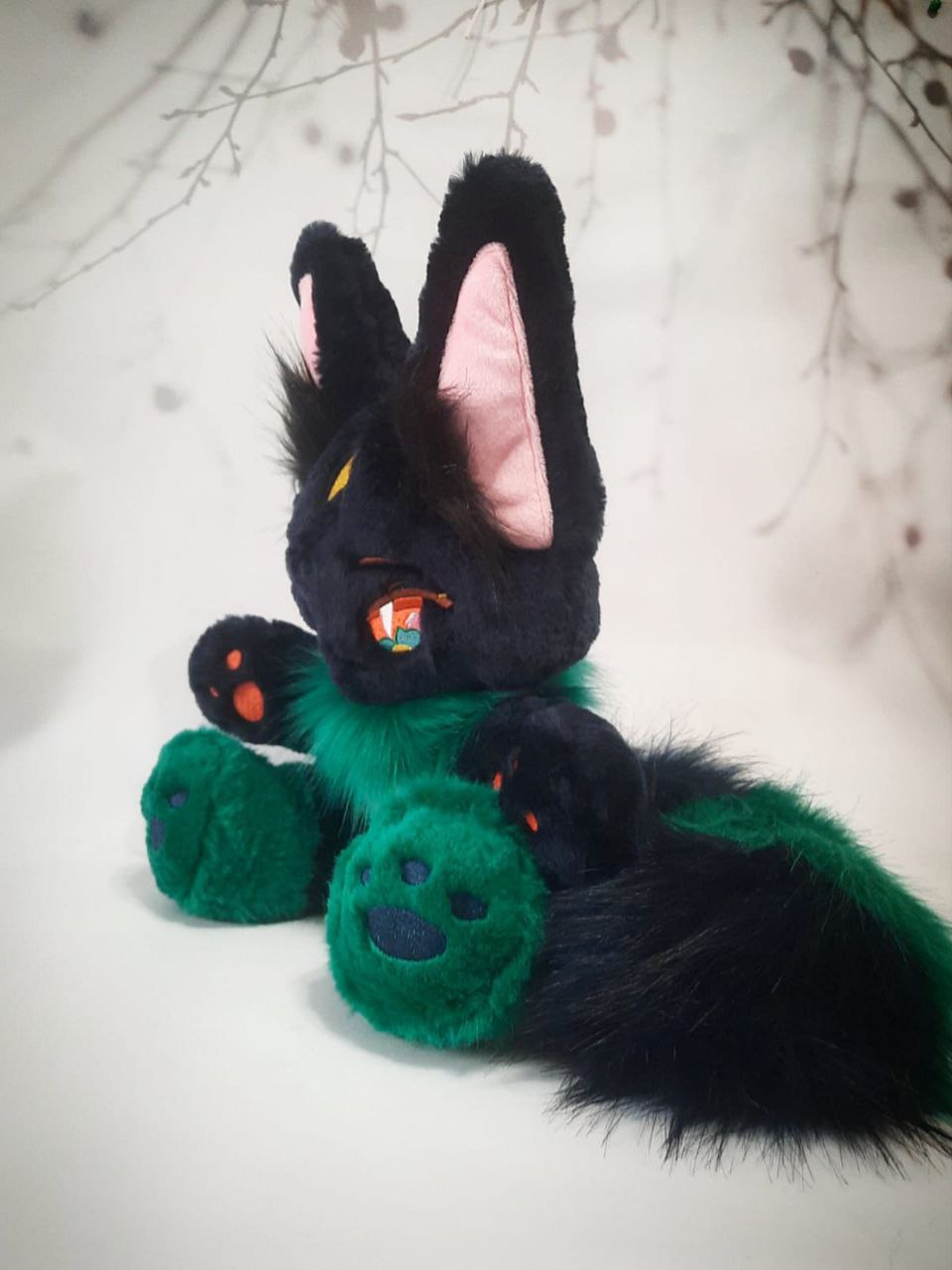 Fluffy black fox plush with a long tail Fluffy black fox plush with a long faux fur tail, pink ears and green paws, handmade to order from a photo