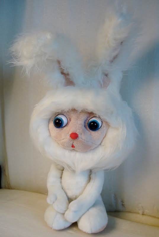 Fluffy cartoon bunny plush, handmade Fluffy cartoon bunny plush sitting with its paws together, white faux fur and a peach face, made to order