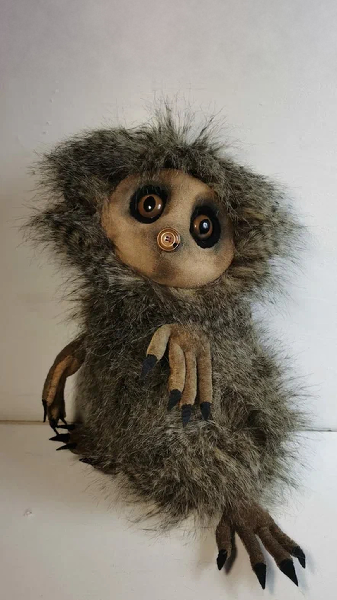 Forest creature plush with big amber eyes and raised clawed hands, handmade to order from a drawing