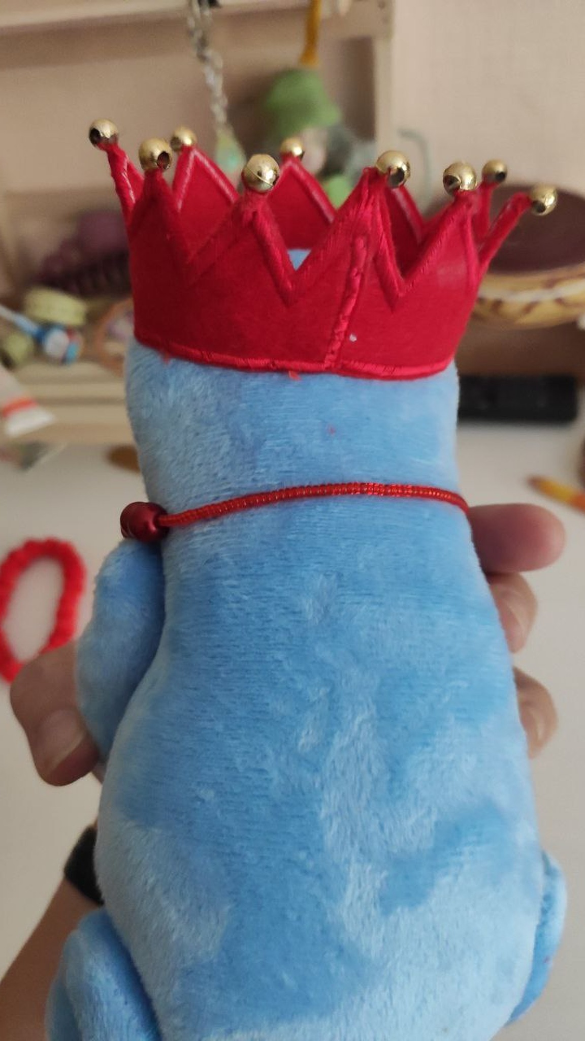 Red crown with gold beads on the frog princess plush, light-blue plush back, custom toy from a sticker