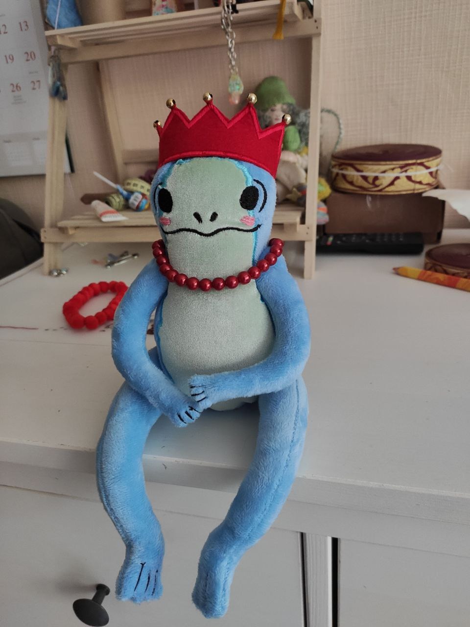 Frog princess plush with a bead necklace Frog princess plush with a red bead necklace instead of pom-poms, blue sticker toy sewn to order