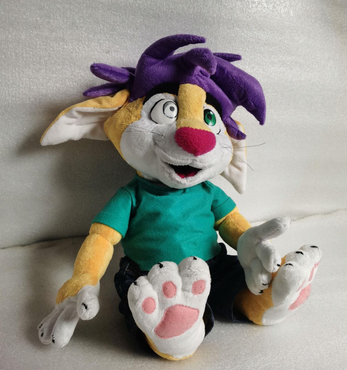 Furry fox plush sitting Furry fox plush sitting with feet up, pink paw pads, purple hair and odd eyes, sticker character made to order