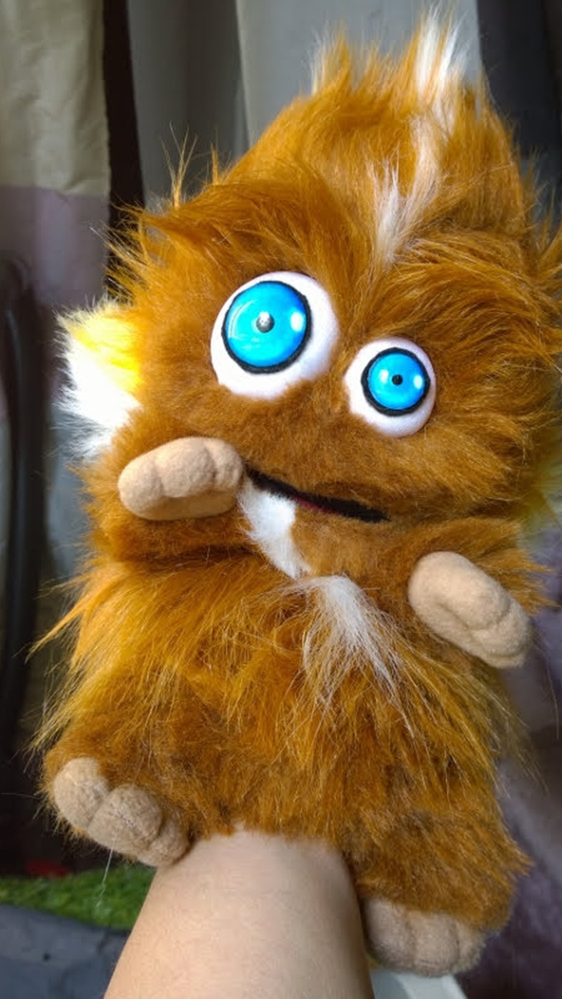 Furry monster hand puppet worn on a hand, ginger fur, painted blue eyes and soft paws, handmade to order