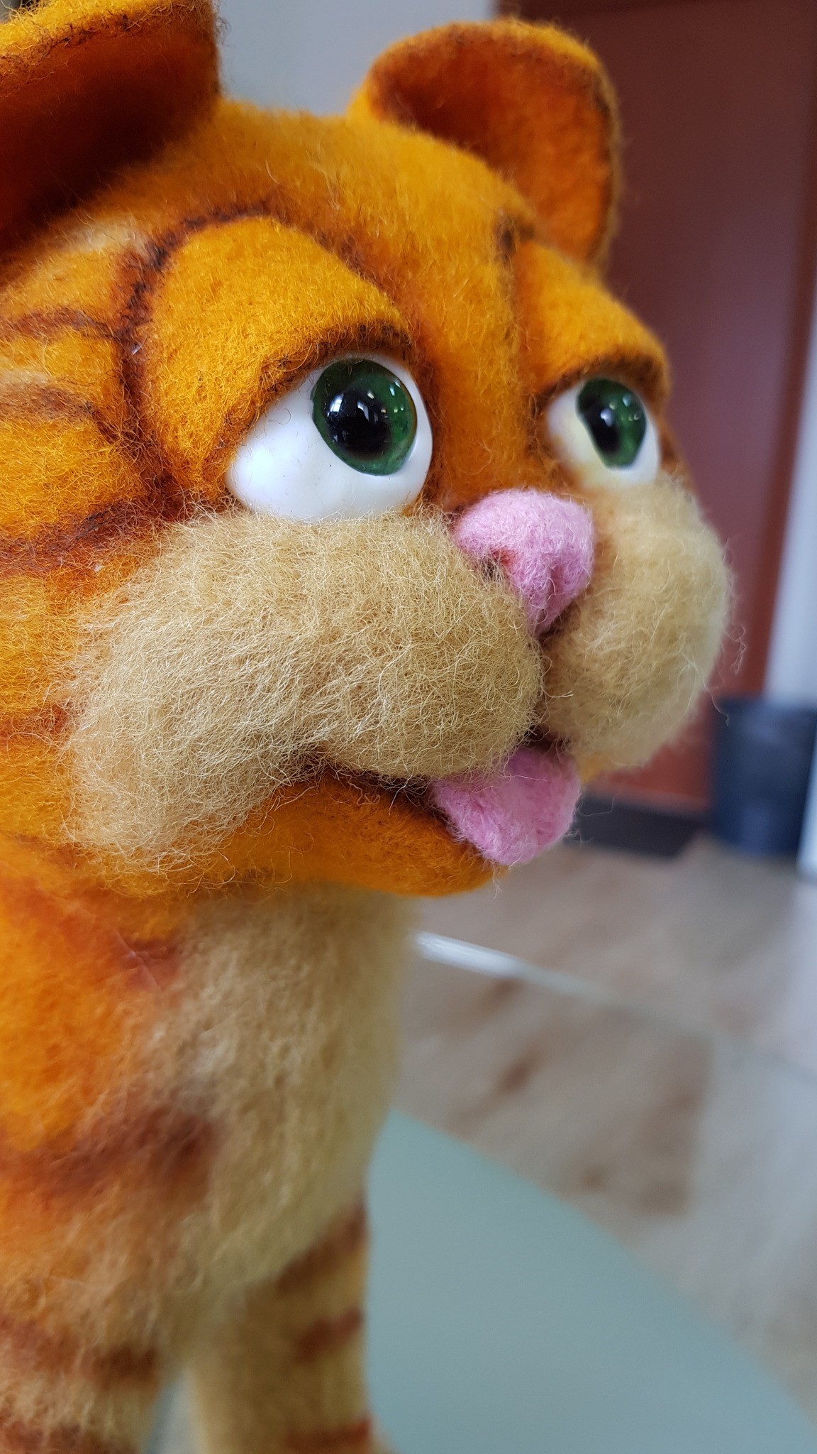 Custom Garfield plush with heavy eyelids, green eyes and a pink tongue, needle felted by hand