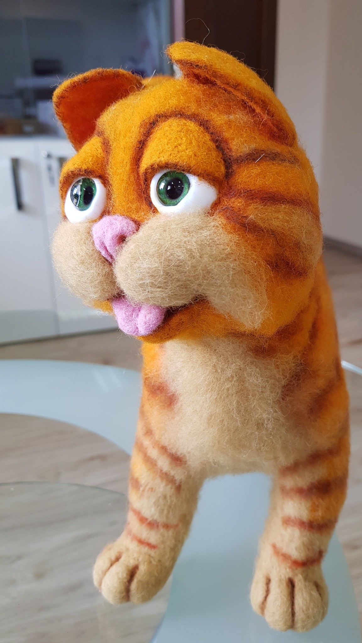 Garfield plush with rust tabby stripes and beige paws, felted from wool and made to order